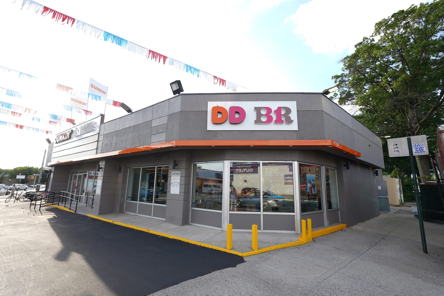 Dunkin' in Ozone Park, Jamaica, New York, designed by Zelta Design