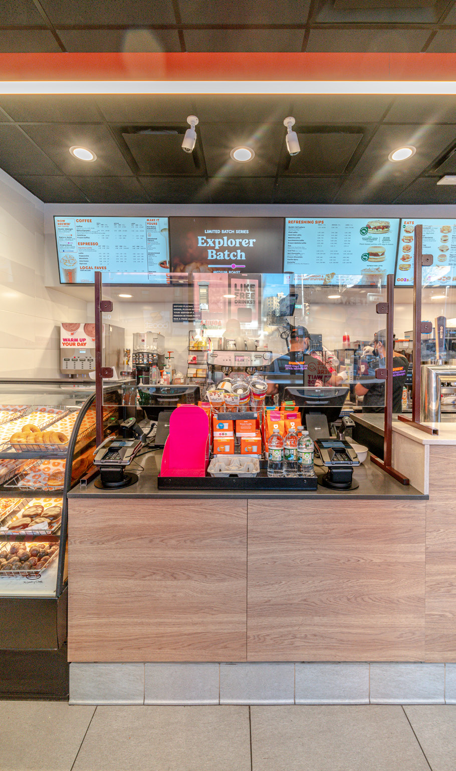 Dunkin' in East Harlem, New York, designed by Zelta Design